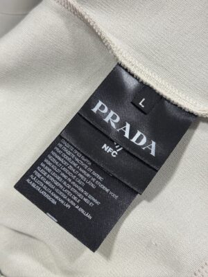 White prada half zip sweater