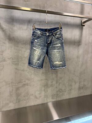 Blue AMIRI distressed denim shorts