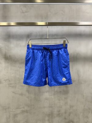 Blue Moncler all-over M pattern monogram-jacquard swim shorts
