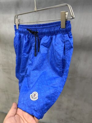 Blue Moncler all-over M pattern monogram-jacquard swim shorts