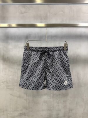 Black Moncler all-over M pattern monogram-jacquard swim shorts