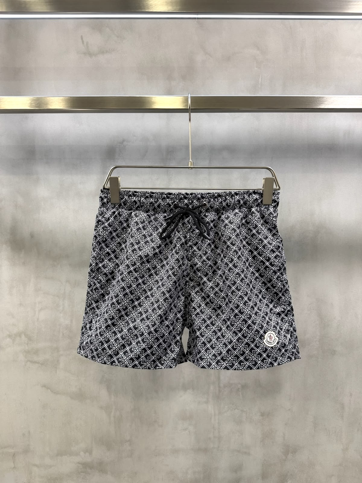 Black Moncler all-over M pattern monogram-jacquard swim shorts