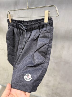 Black on black Moncler all-over M pattern monogram-jacquard swim shorts