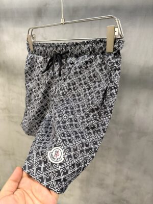 Black Moncler all-over M pattern monogram-jacquard swim shorts