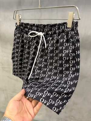 Black Off-White all-over stenciled monogram Logo swim shorts